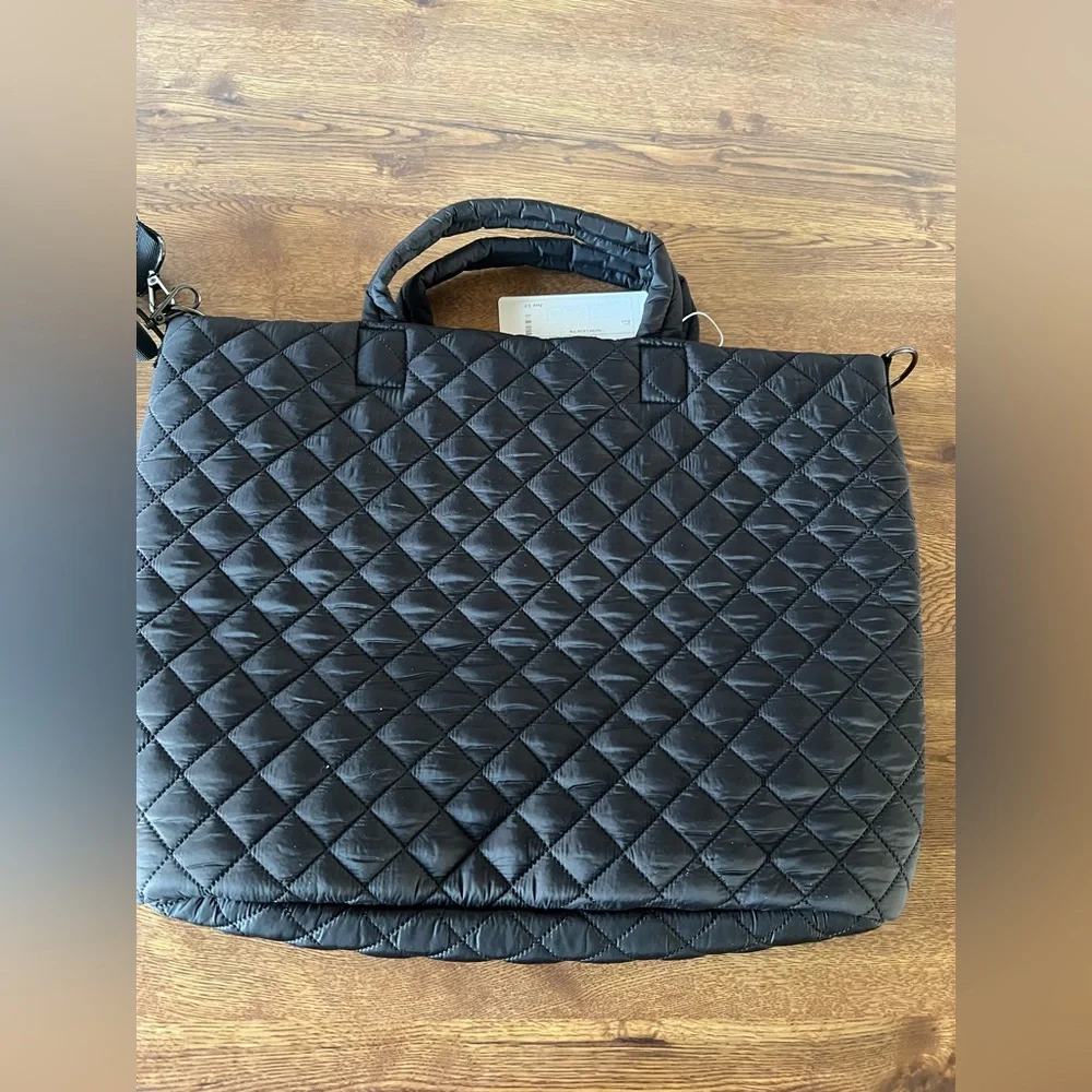 Marleylilly monogrammed black quilted laptop bag with the initials MML